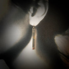 Load image into Gallery viewer, Solid sterling silver and gold earrings set with deep pink Rubies.