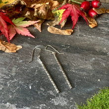 Load image into Gallery viewer, Elegant twisted silver drop earrings.