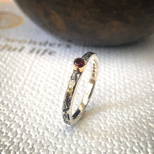 Load image into Gallery viewer, Solid sterling silver and gold ring set with a deep red garnet. Size Q1/2