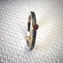 Load image into Gallery viewer, Solid sterling silver and gold ring set with a deep red garnet. Size Q1/2