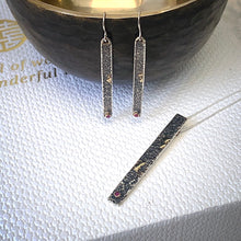 Load image into Gallery viewer, Solid sterling silver and gold earrings set with deep pink Rubies.