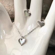 Load image into Gallery viewer, Dainty Silver heart stud earrings.