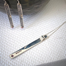 Load image into Gallery viewer, Solid sterling silver and gold pendant set with deep pink ruby.