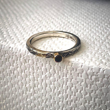 Load image into Gallery viewer, Solid sterling silver and gold ring set with a deep red garnet. Size Q1/2