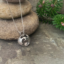 Load image into Gallery viewer, "Galaxy", hollow form, reversible sterling silver pendant.