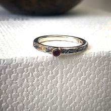 Load image into Gallery viewer, Solid sterling silver and gold ring set with a deep red garnet. Size Q1/2