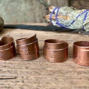 Solid copper, adjustable, wide band wrap rings. Made to order