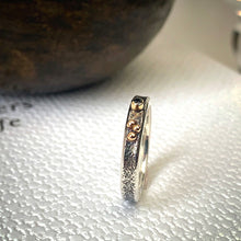 Load image into Gallery viewer, Solid sterling silver and gold ring set with a sparkling black spinel. Size O 1/2

