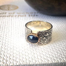 Load image into Gallery viewer, Solid sterling silver and gold ring set with deep blue, rose cut Sapphire. Size R1/2
