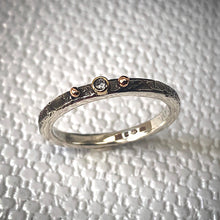 Load image into Gallery viewer, Solid sterling silver and gold ring set with a sparkling 2mm Diamond. Size R
