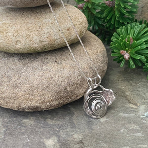 "Galaxy", hollow form, reversible sterling silver pendant.