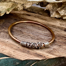 Load image into Gallery viewer, Copper and sterling silver bangle.
