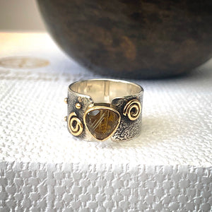 Solid sterling silver and gold ring set with incredible gold rutile quartz. Size T