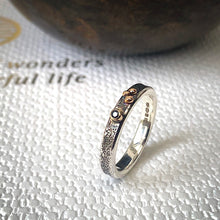 Load image into Gallery viewer, Solid sterling silver and gold ring set with a sparkling black spinel. Size O 1/2
