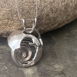 "Galaxy", hollow form, reversible sterling silver pendant.