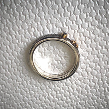 Load image into Gallery viewer, Solid sterling silver and gold ring set with a sparkling black spinel. Size O 1/2

