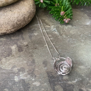 "Galaxy", hollow form, reversible sterling silver pendant.