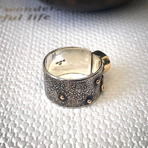 Solid sterling silver and gold ring set with incredible gold rutile quartz. Size T