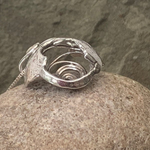 "Galaxy", hollow form, reversible sterling silver pendant.